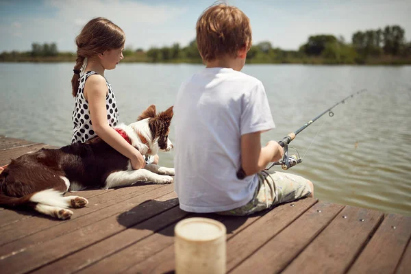 Brother Sister Enjoying Fishing Dog Sunny Day — Stock Photo, Image