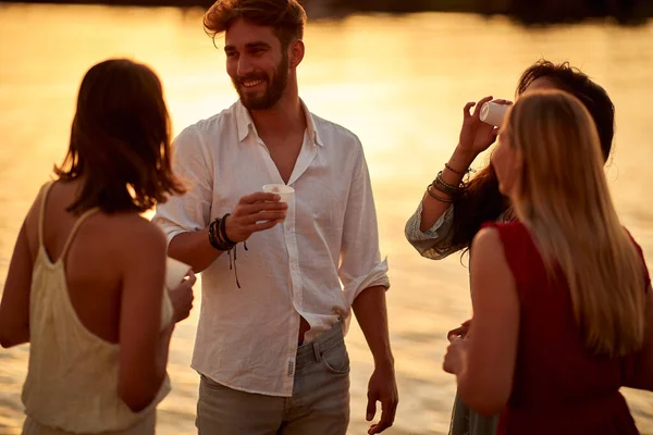 Young Handsome Man Flirting Drinking Girls Party Lake Beautiful Sunset — Stock Photo, Image