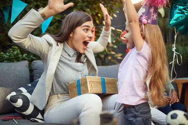 Happy Young Adult Female Making Birthday Surprise Little Caucasian Girl — Stock Photo, Image