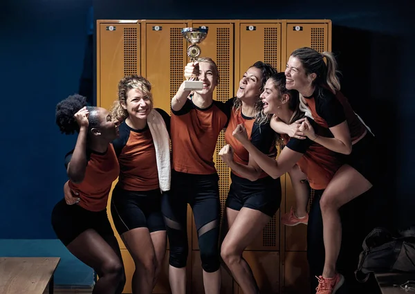 Female Team Celebrating Won Cup Locker Room — Stock Photo, Image