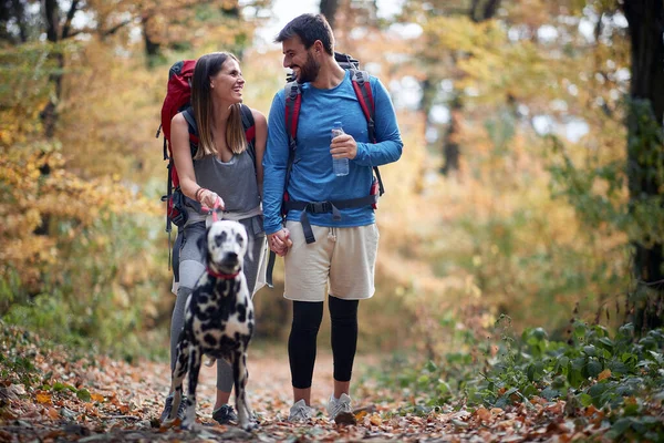 Couples Hiking Together Dog Active Lifestyle Concept — Stock Photo, Image