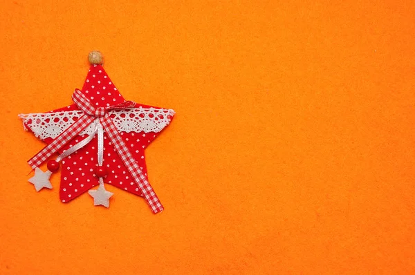 Una Estrella Roja Sobre Fondo Naranja — Foto de Stock