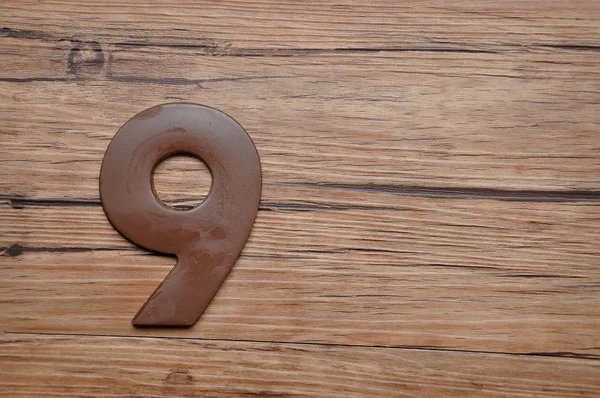 Un numéro 9 fait de chocolat — Photo