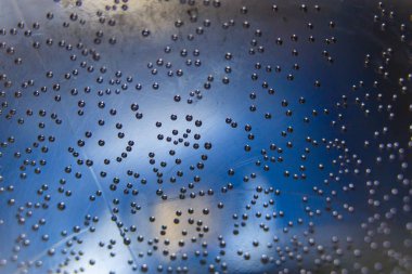 Küçük hava kabarcıkları yüzey makro üzerinde