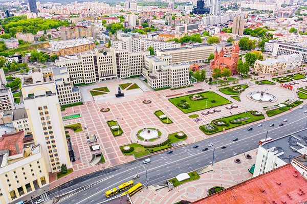 Minsk, Belarus - May 11, 2019: Public transport moving along main street near Independence square, Minsk. Aerial landscape