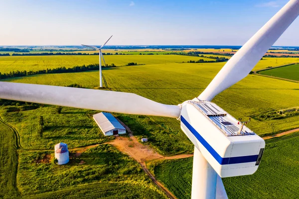 Wind turbine propeller close up. Reneable energy in countryside. Aerial landscape