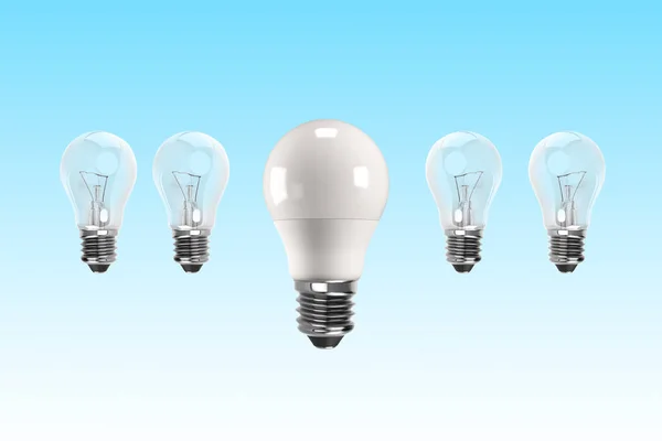 Une Ampoule Led Avec Quatre Ampoules Incandescentes Derrière Concept Économie — Photo