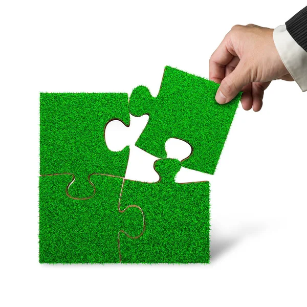 Male Hand Put Last Piece Green Grass Jigsaw Puzzle Complete — Stock Photo, Image