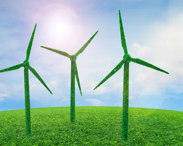Concept of ECO, green energy and circular economy, green grass in wind turbines shape on grass meadow, with sunny sky clouds background.