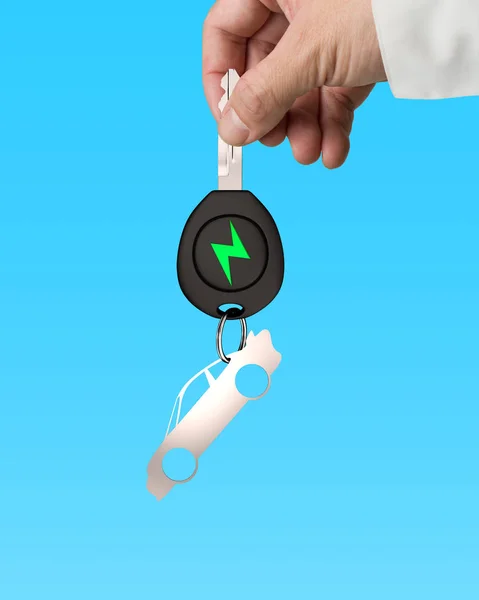 Hand give electric car key sports car sheet metal keyring. — Stock Photo, Image