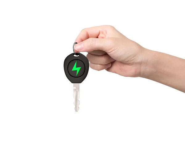 Mano dare la chiave dell'automobile elettrica con il segno verde del fulmine . — Foto Stock