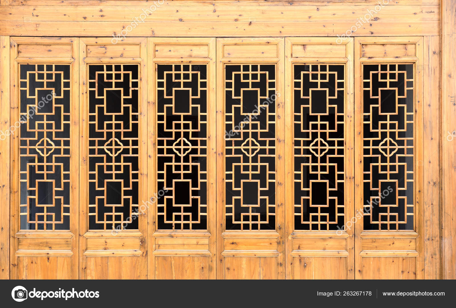 Closeup Chinese old wooden frame door with decorative