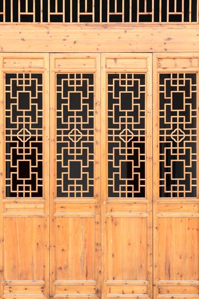 Closeup Chinese old wooden frame door with decorative pattern un — Stock Photo, Image