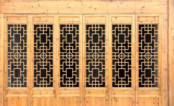 Closeup Chinese old wooden frame door with decorative pattern un — Stock Photo, Image