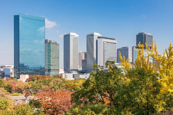 Beautiful Cityscape Osaka Autumn Group Skyscrapers Colorful Woods Foregroud Blue — стоковое фото