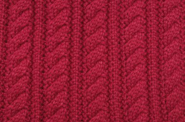 El yapımı kırmızı örgü yün doku arka plan.