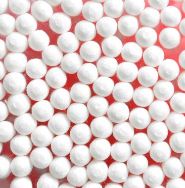 Pamuk yığını arka plan, hijyenik kozmetik ve sağlık donatı çubuk. Yukarıdan görüntülemek.