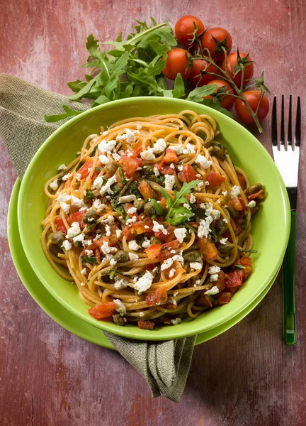Spaghetti Tomatoes Cheese Capers Arugula — Stock Photo, Image