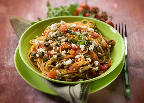 Spaghetti Tomatoes Cheese Capers Arugula Selective Focus — Stock Photo, Image