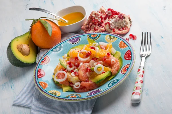 salad with avocado grapefruit orange and pomegranate