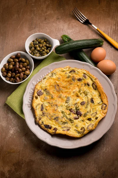 Omelette Zucchinis Black Olives Capers — Stock Photo, Image