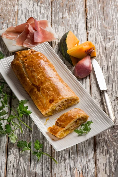 Strudel puff pastry with parma ham and pumkin — Stock Photo, Image