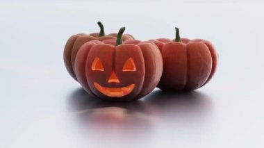 Beyaz bir arka plan üzerinde sonsuz dönüşümlü olarak üç Halloween Pumpkins