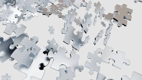 Lots of Grey Puzzle pieces scattered — Stock Photo, Image