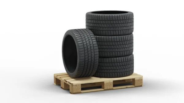 Quatro pneus esportivos grandes empilhados em uma palete de madeira — Fotografia de Stock