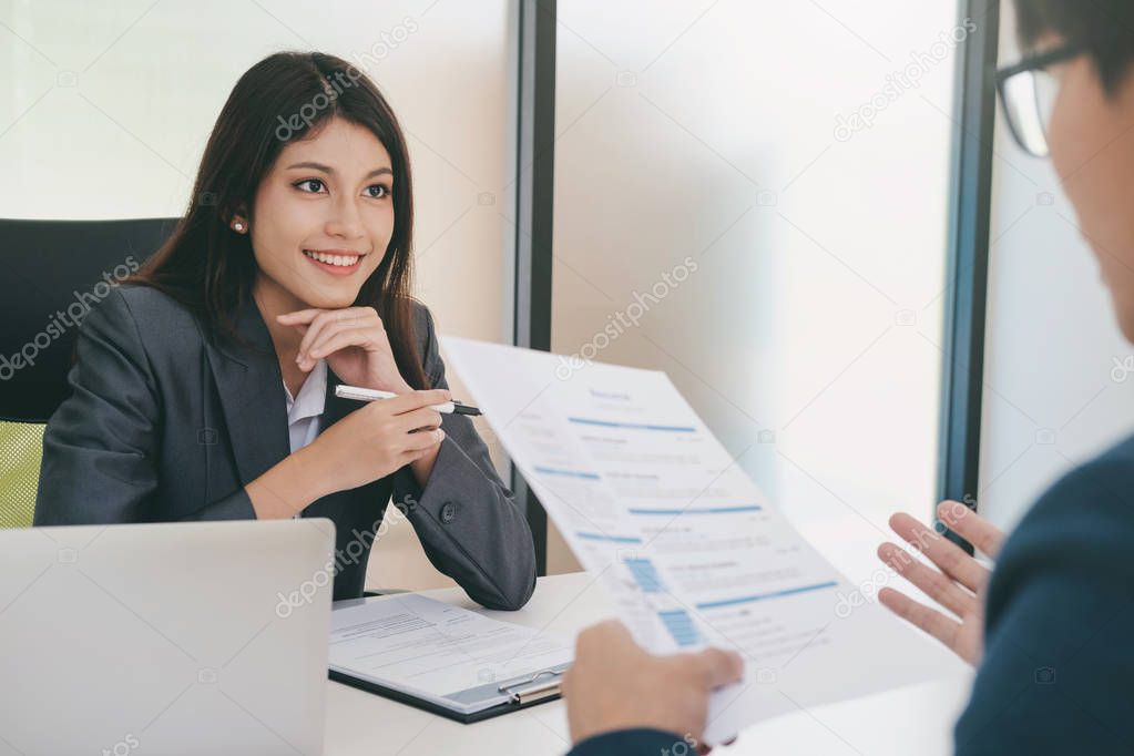 Business situation, job interview concept. Confident businessman in a job interview with a corporate personnel manager. 