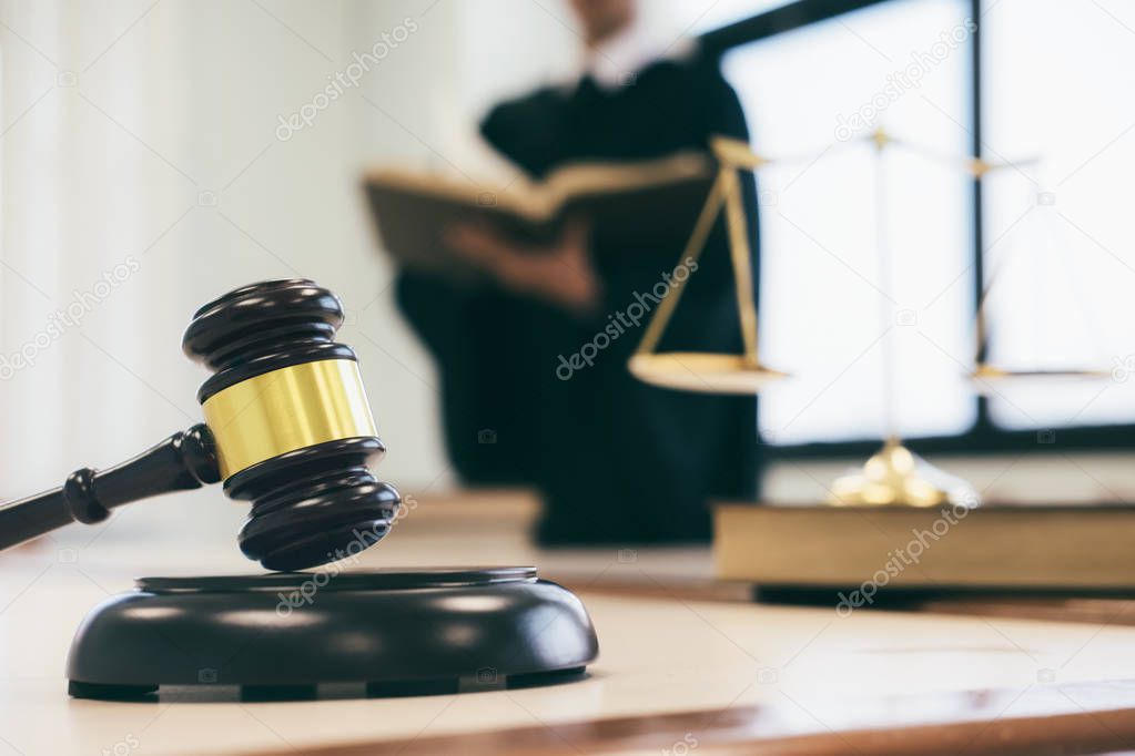 Concepts of law. Lawyer or judge work in the office with gavel and balance.