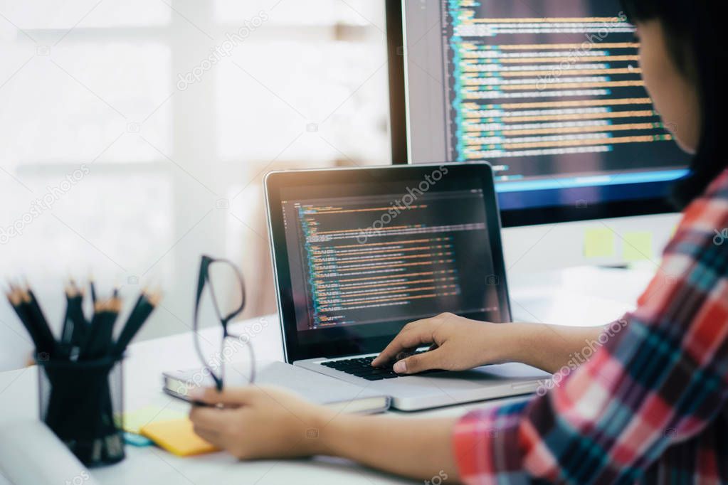 Programmer and UX UI designer working in a software development and coding technologies. Mobile and website design and programing development technology