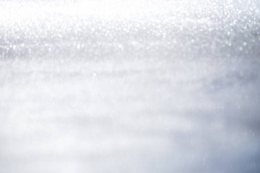 Soyut gümüş glitter bokeh yumuşak açık renkli ışıklarla.