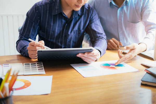 Team of creative graphic designers working together.