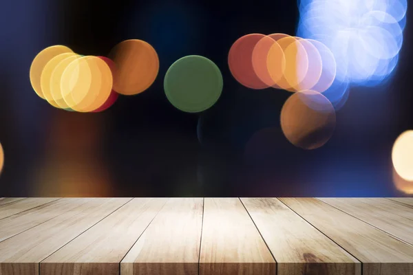 Mesa de madera con fondo borroso de la cafetería . — Foto de Stock