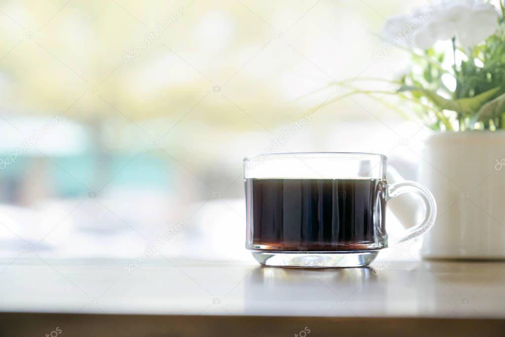 A cup of coffee on the table. 