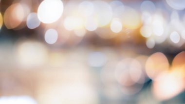Abstract blurred bokeh light with warm tone color background con