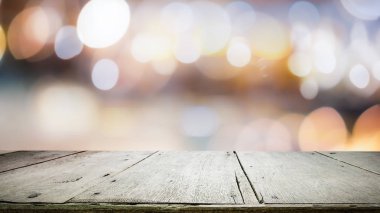 Bokeh soyut arkaplan üzerinde tahta masa üstü ve montaj için kullanılır