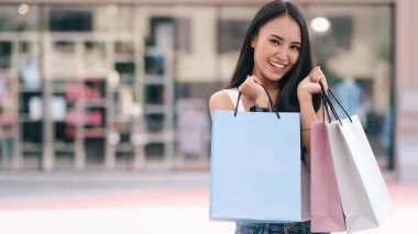 Happy beautiful  woman enjoying in shopping.