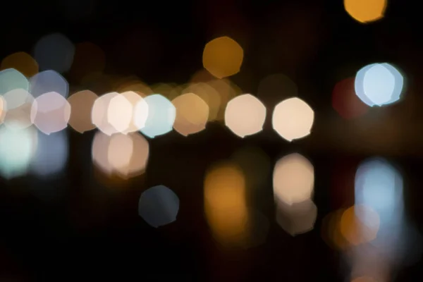都市の夜の光のブラーbokeh背景とともにヴィンテージ効果co — ストック写真