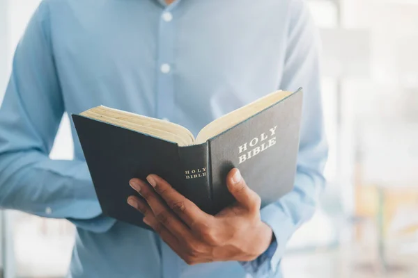 Religion Christianity Concept Man Holding Reading Holy Christian Bible — Stock Photo, Image