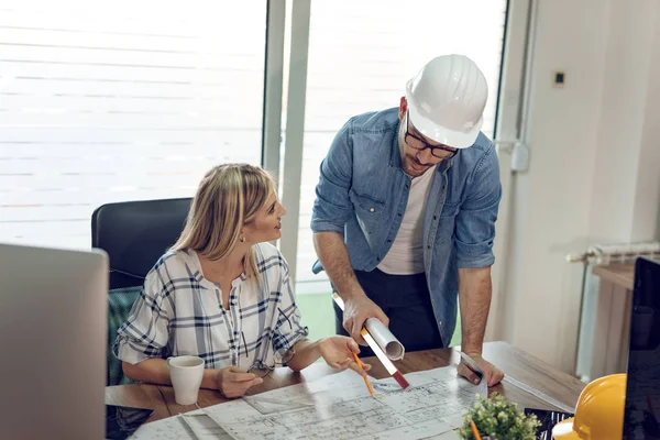 Young Architect Colleagues Analyzing Blueprints Office — Stock Photo, Image