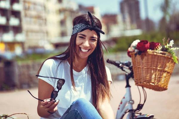 happy young woman having fun on summer city street