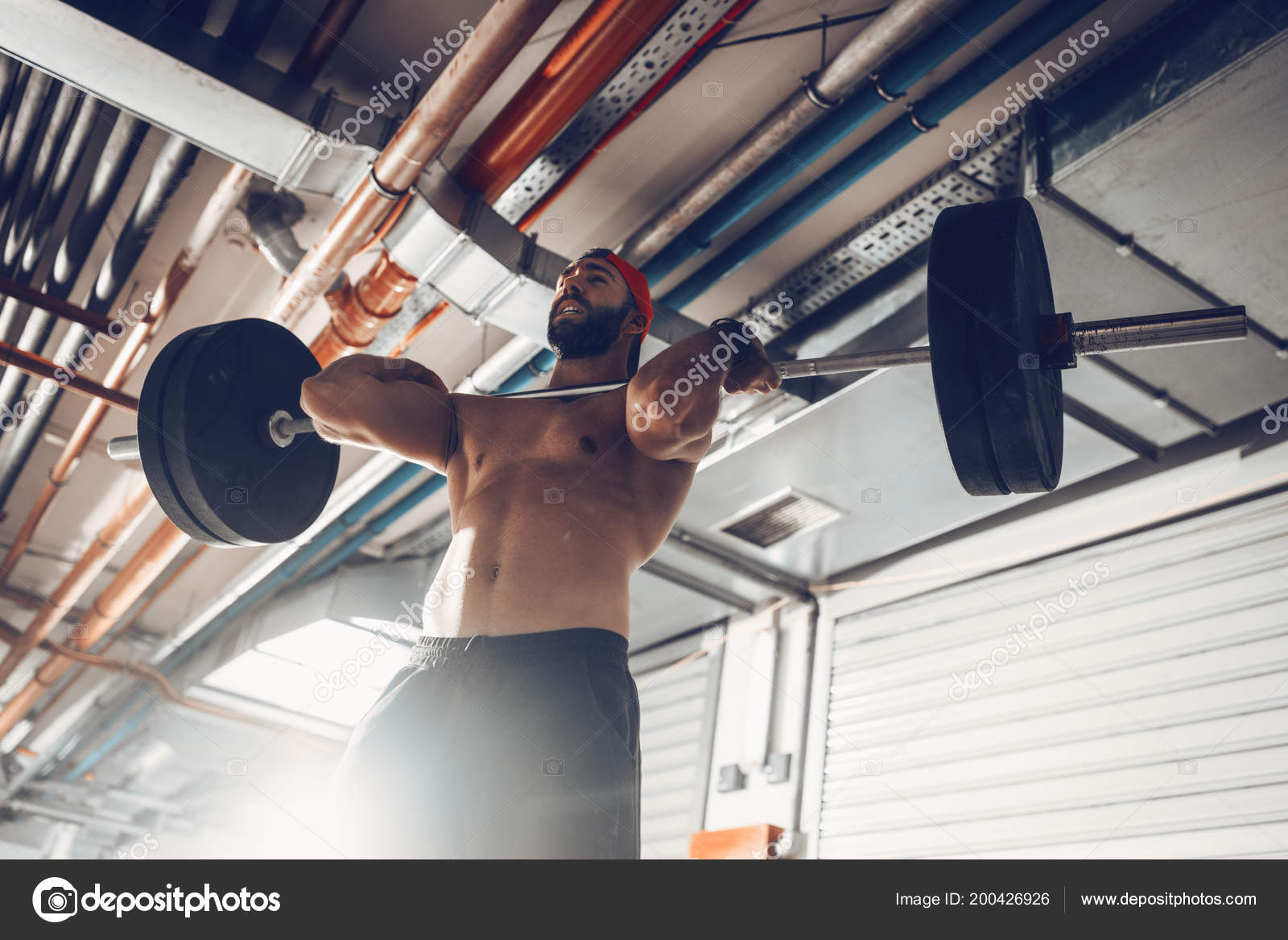 Young Muscular Man Doing High Pull Exercise Barbell Cross Training