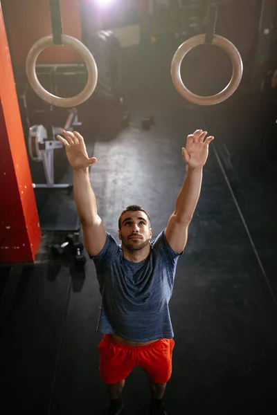 Young Muscular Man Doing Exercise Gymnast Rings Gym — Stock Photo, Image