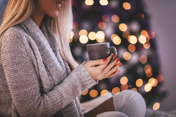 Young Smiling Woman Drinking Cup Coffee Glowing Christmas Decorated Interior — Stock Photo, Image