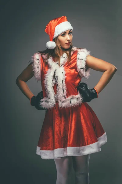 Young Angry Woman Santa Claus Costume Boxing Gloves Grey Background — Stock Photo, Image