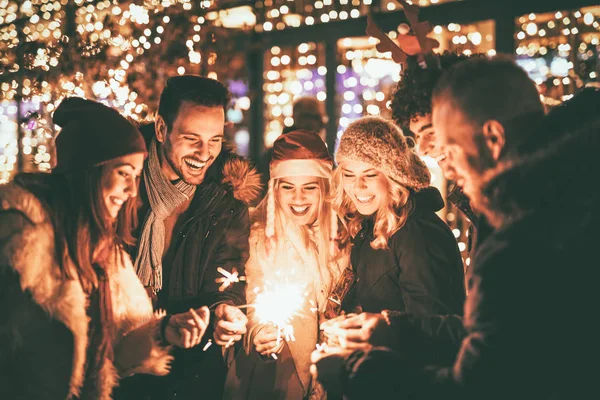 Group Cheerful Friends Sparklers Enjoying Christmas Evening — Stock Photo, Image