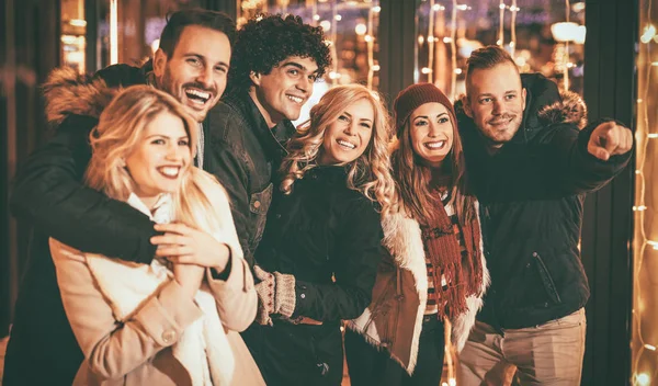 Friends celebrating Christmas — Stock Photo, Image