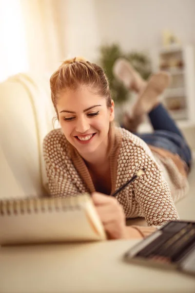 Young Smiling Woman Relaxing Drawing Sketchbook Home — Stock Photo, Image